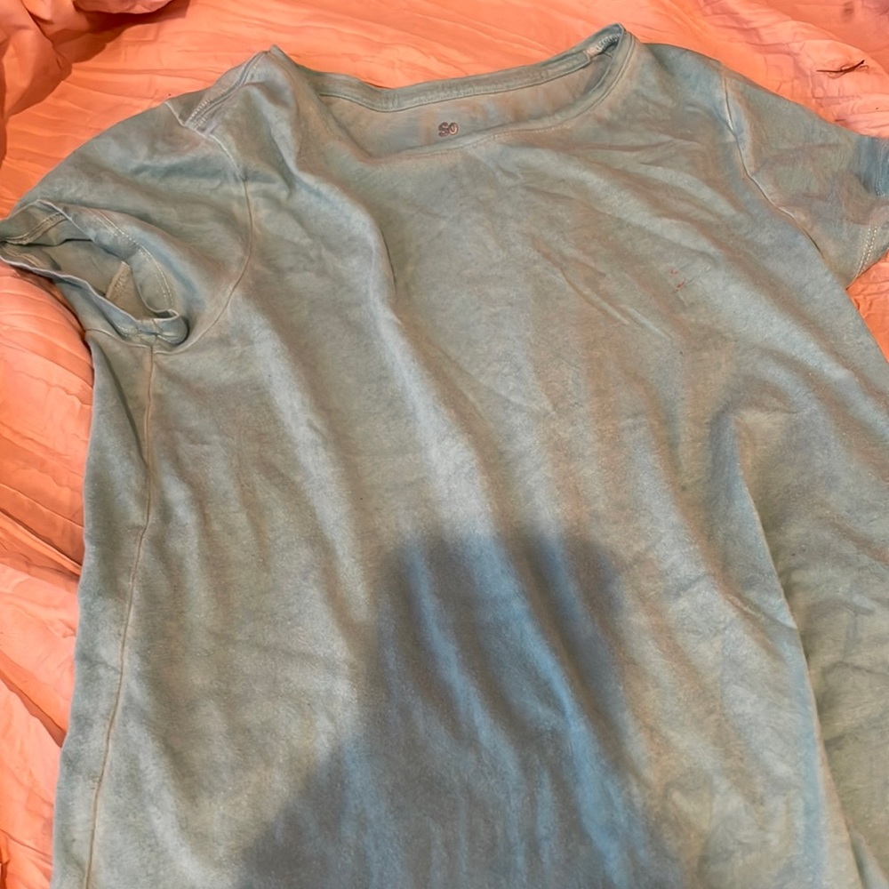 So teal shirt